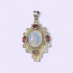 Ornate Moonstone And Garnet Pendant In A Bali Syle Sterling Silver Setting